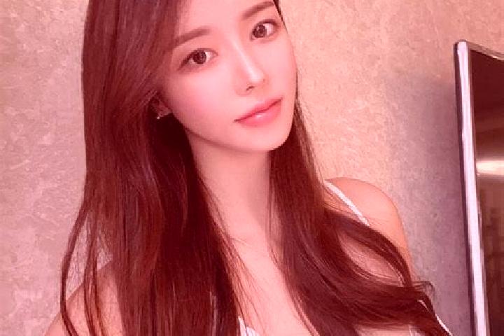 Emily, 34 — Escort in Qiaowa, China