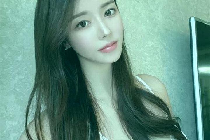 Lily, 39 — Escort in Bahuang, China